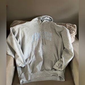 grey oversized hoodie! it’s so soft inside and not over worn at all!